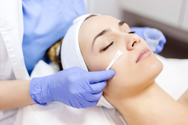 Woman getting Salicylic Treatment